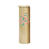 A gold colored tumbler with 