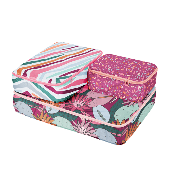 small, medium, and large packing cube set which folds into a pouch. One with cranberry speckle, one jewel tone stripes, and one floral collage.