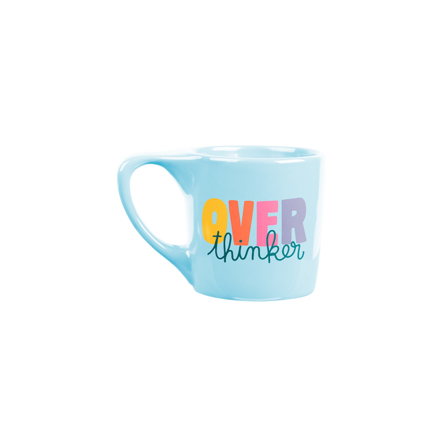 Bright blue coffee mug saying "over thinker"