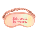A cute pastel sleep mask that says shit could be worse 