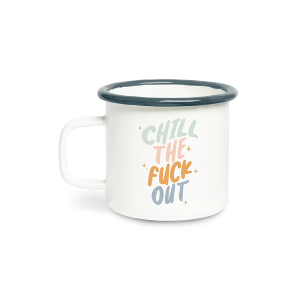A ceramic white mug with the phrase "Chill the fuck out" on it in pastel coloring. Rim of mug is a navy blue.